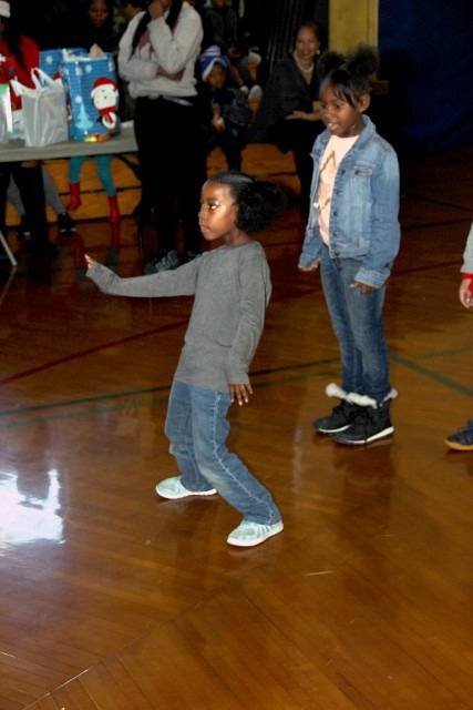 Girl dancing on the floor.