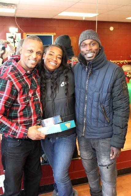 Three people posing for photo