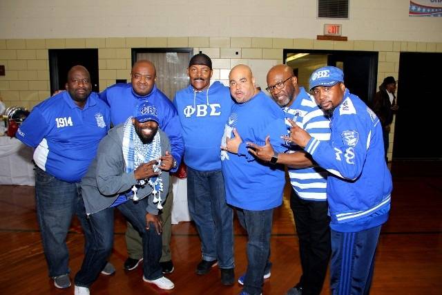 Men in blue shirts