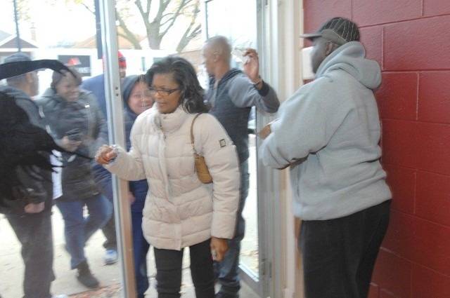 People entering a building.